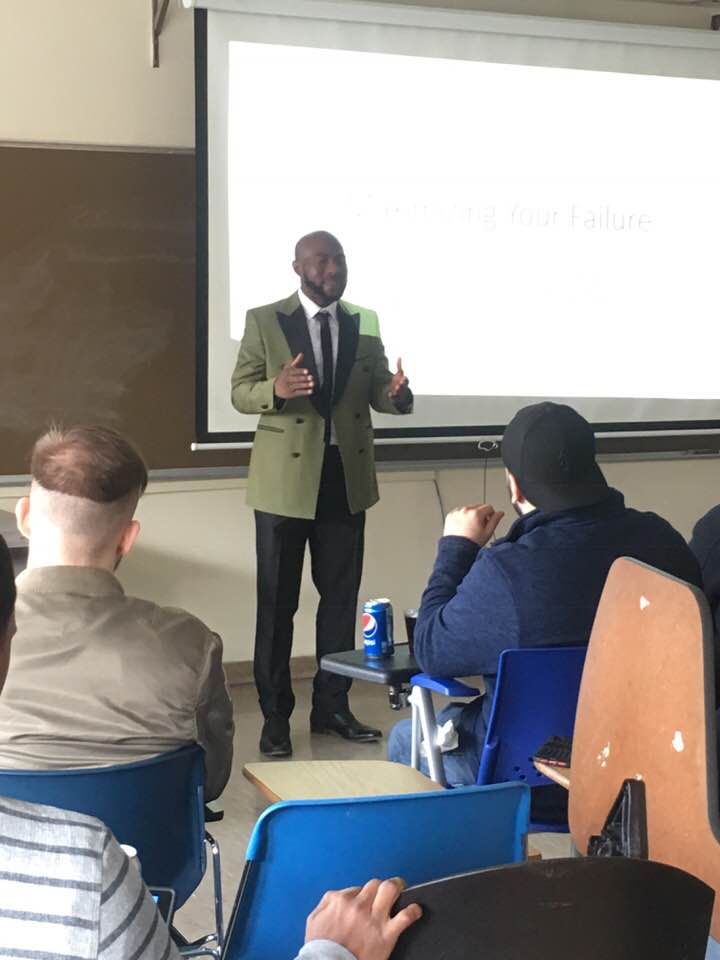 Henry Ukazu speaking at Bourough of Manhattan Community College