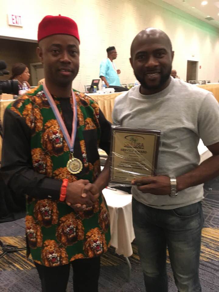 Henry Ukazu receiving ORA USA Award